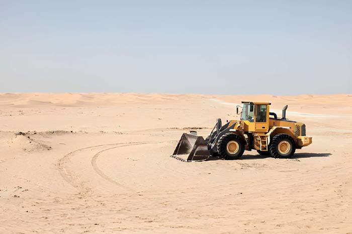 backhoe lodding drigger